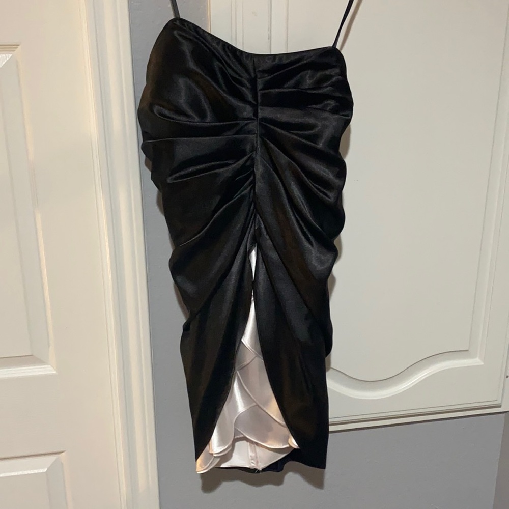 Ruched black and white strapless prom dress.